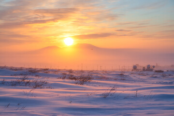 Wall Mural - satellite dishes and a flying helicopter in the arctic. winter arctic landscape. sunset over the tun