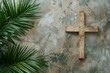 Palm Sunday background Wooden cross and palm leaves on neutral background with copy space for text. Christianity, faith, religious, Holy Week concept