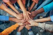 © Adobe Contributor - Multiracial group of people joining hands together in unity and support