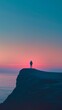 © Adobe Contributor - Man standing alone on a cliff during sunset