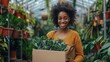 Woman Holding Box of Plants