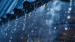 Gentle raindrops falling from a dark blue umbrella
