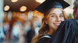 © Dina Photo Stories - Happy young woman with her father on graduation day. Smiling female student embraces her father after graduation ceremony. Young woman in graduation gown and cap hugging her parents