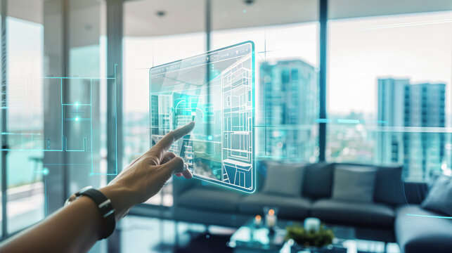 man hand is using a futuristic latest innovative technology glass tablet with augmented reality holograms as a remote control of smart home appliances at modern home or office. Smart home concept.