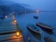 A group of boats are docked at a pier with a lake in the background. The boats are blue and red, and there are lanterns lit up on the pier. The scene has a peaceful and serene atmosphere
