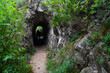 Stone carved tunnel in Nerei Gorges Natural Park, Romania, Europe