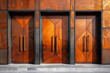 A series of door designs for a modern building where each door features a more complex geometric des