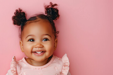 Wall Mural - African little girl smiling over pink background