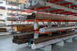 Warehouse cantilever racks for storing copper pipes or profiles. Pallet racks and industrial warehouse racks. 