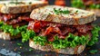 A delicious bacon sandwich with lettuce on granary bread.