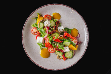 Wall Mural - salad with baked bell peppers tomatoes cucumber red onion and feta cheese