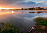 Fototapeta  - Khmelnitsky city in Ukraine, view of the Southern Bug River at sunset