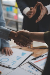 meeting and greeting concept, two confident business handshake and business people after discussing 