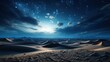 Stars and clouds above sand dunes at night