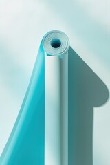 Poster - A roll of blue and white paper on a white surface. Ideal for design projects