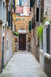 Venice, Italy: glimpse of a charming Venetian calle (street) in the Cannaregio sestiere (district)