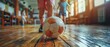 Children excel in Futsal indoor soccer class demonstrating skill on wooden floor. Concept Indoor Soccer, Futsal Class, Children's Sports, Skill Demonstrations, Wooden Floor Techniques