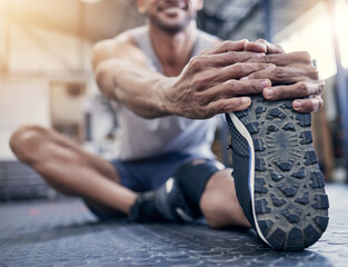 Poster - Fitness, leg and man with stretching at gym for workout, warm up and performance on floor. Training, health club and foot of male person with preparation for exercise, flexibility and cardio energy