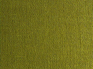 Flax green linen canvas background or texture. Fabric green olive color pattern. Grunge natural linen old textile wall background. Woven natural vintage flax canvas texture rustic book wrapper macro