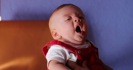 Wall Mural - Sleepy Cute adorable baby yawning expression