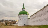 Fototapeta Las - The tower and wall of the ancient Trinity-Sergius Lavra