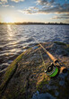 Sunset over the sea with fly rod