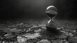 A black and white image of an hourglass with the sand grains slowly trickling down signifying the passage of time.