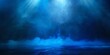 Abstract image of dark blue smoky backgrounds with light rays for product display. Black room or stage background for show or showcase.Panoramic view of the abstract fog mist clouds.