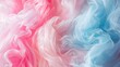Detailed close up of intertwining pink and blue cotton candy strands in soft pastel colors