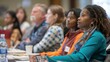 © Ilia Nesolenyi - Multicultural audience engaged in professional workshop, sitting at a table discussing