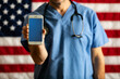 Health: Anonymous Doctor Holds Cell Phone