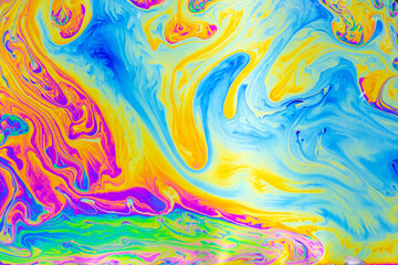 Wall Mural - psychedelic multicolored background abstract. rainbow colors. patterns background. photo macro shot 