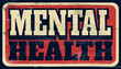 Aged and worn mental health sign on wood