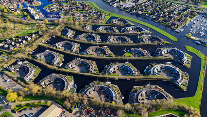 Wall Mural - Aerial drone view geometric pattern of water houses, marina, yachts Marina Park Lemmer Netherlands