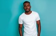 © Balaraw - Confident young man in white t-shirt against turquoise background