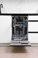 Sticker - Open clean empty dishwasher in kitchen. Home appliance