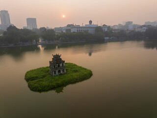 Wall Mural - Drone closed view of Turtle tower in Hoan Kiem lake in Hanoi, Vietnam