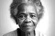 close-up portrait of a senior old black african american woman with grey hair, studio photo, isolated on white background