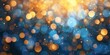Abstract background of shimmering golden and blue bokeh lights, ideal for festive or luxury themes.
