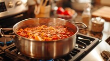 A Pot Of Pasta And Sauce Is Simmering On A Stove In A Southern Homestyle Kitchen In Goa