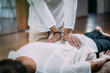 Woman Getting Shiatsu Back Massage.