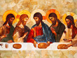 Religious painting of Jesus and disciples gathered for Last Supper, sharing bread and wine.