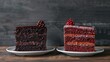 Two slices of layered chocolate cake with red frosting on white plates