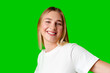 Young Woman in White Shirt Posing for Picture against green background