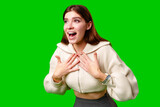 Fototapeta  - A woman wearing a skirt and sweater is striking a pose for a picture, standing confidently in front of the camera.