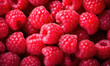 A close up of red raspberries