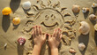 Child's Hands with Seashell Decorated Sand Art