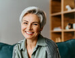 portrait of cheerful smiling beautiful happy 50 year old woman fifty with white grey hair