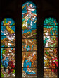 MILAN, ITALY - MARCH 6, 2024: The Nativity (Adoration of Shepherds) on the stained glass of the church Basilica di San Babila by from 20. cent.