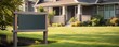 Accurate and detailed digital mockup of a blank yard sign, strategically located in front of a house with a wellmaintained lawn and clear visibility from the street